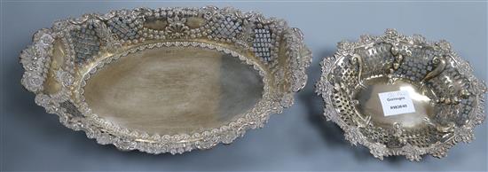 A late Victorian pierced silver dish by Charles Stuart Harris, London, 1893 and a later larger silver dish, 22 oz.